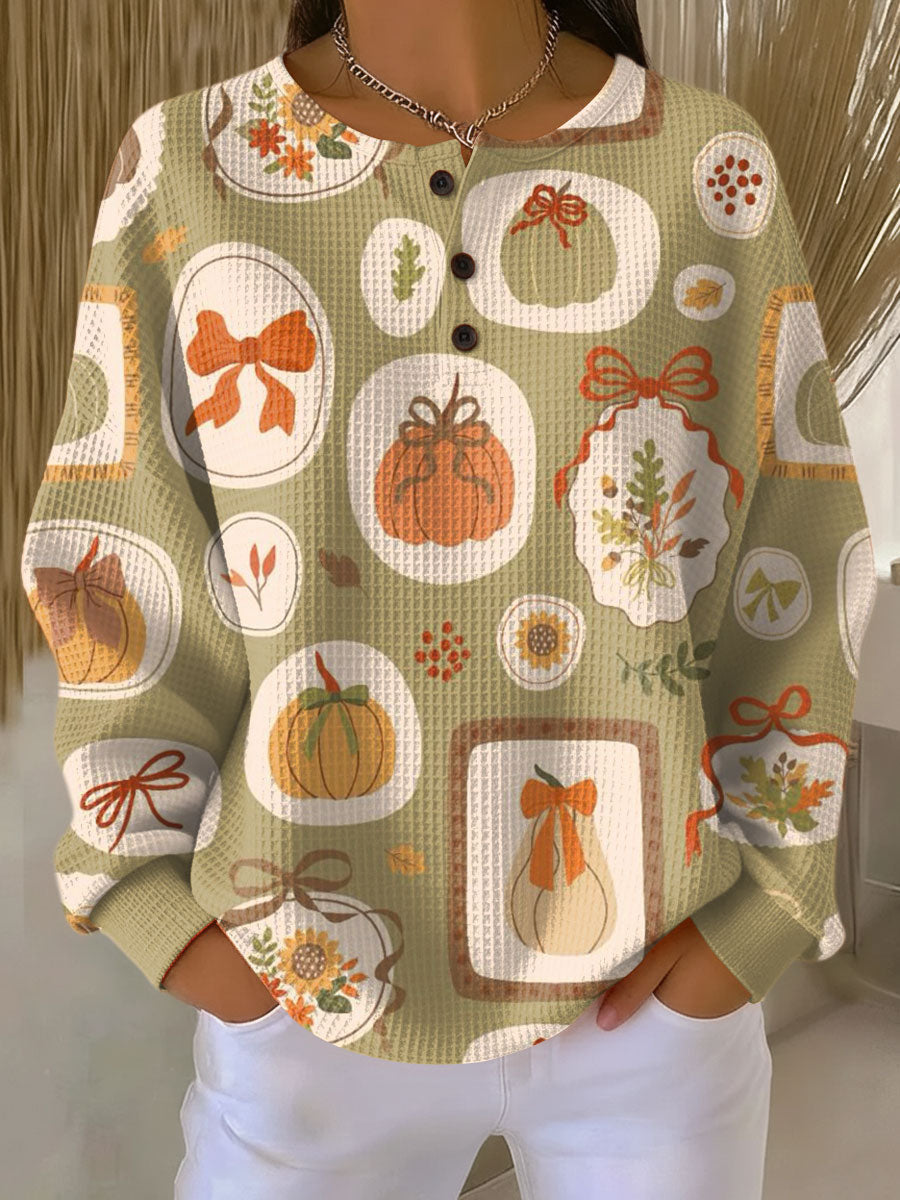 Knusse herfsttrui met pompoen