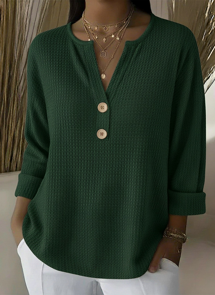 Wafeltrui met henley-detail groen