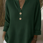 Wafeltrui met henley-detail groen