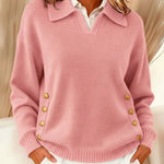 Roze trui met knoopdetail