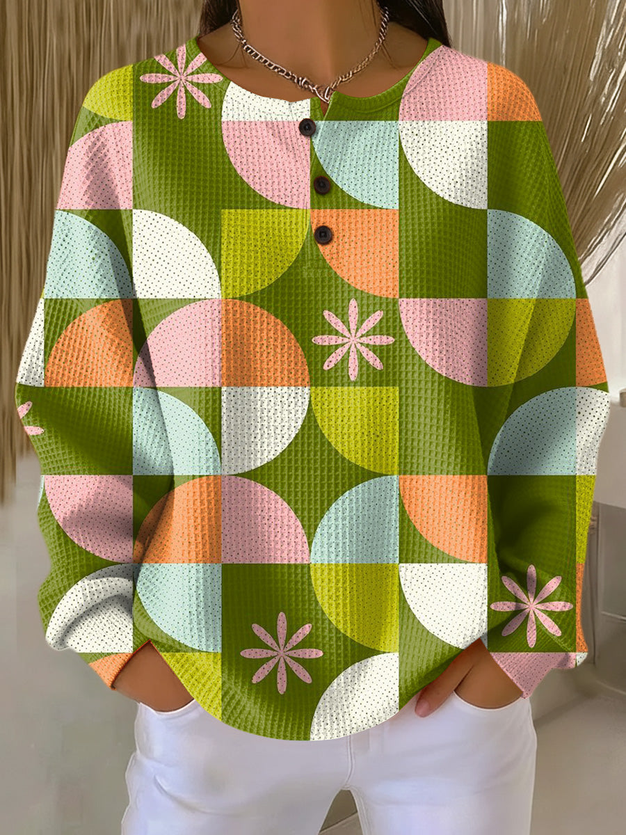 Abstracte geblokte trui
