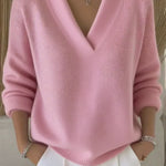 Relaxte V-hals trui roze