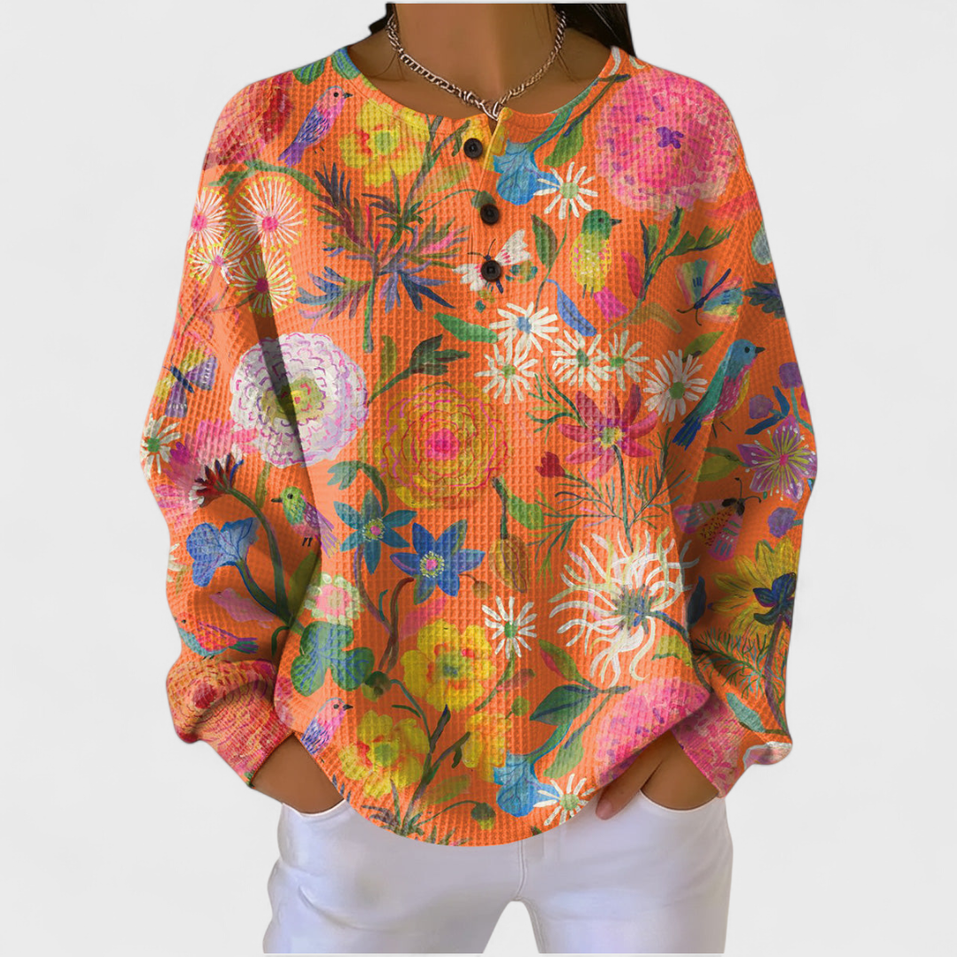 Oranje bloemenprint trui