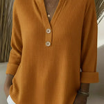 Wafeltrui met henley-detail oranje