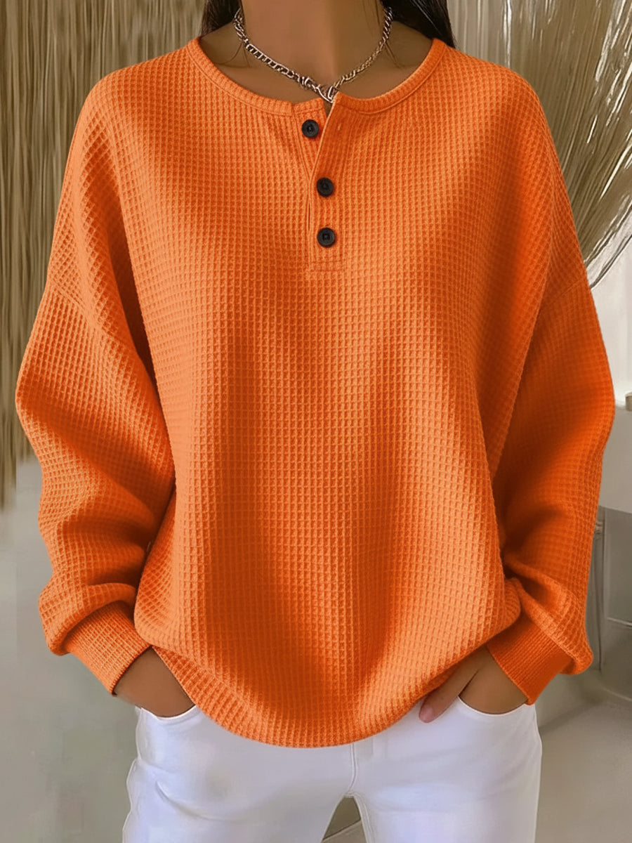 Wafeltrui met henley-hals oranje