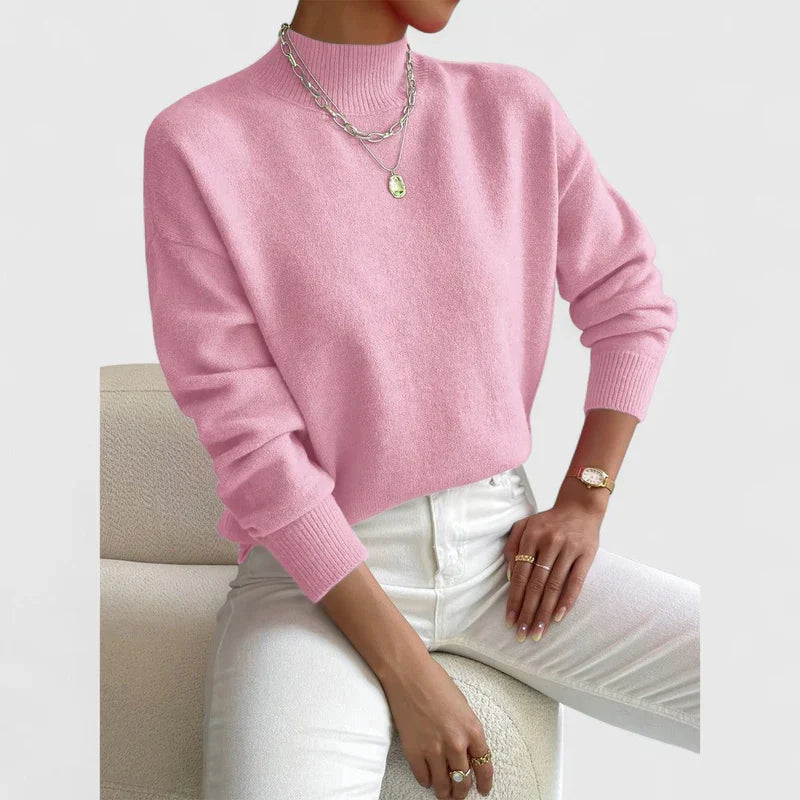 Roze gebreide trui